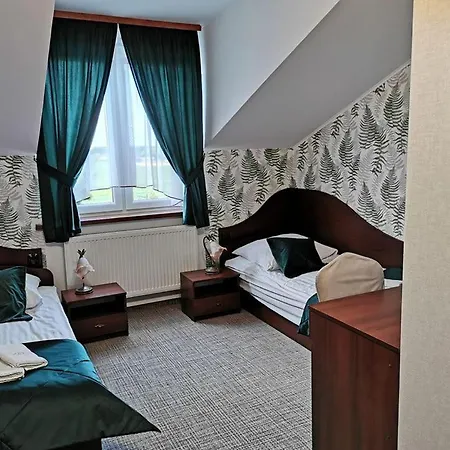 منزل للإقامة Dworek Nad Stawem & Laznia Piwna